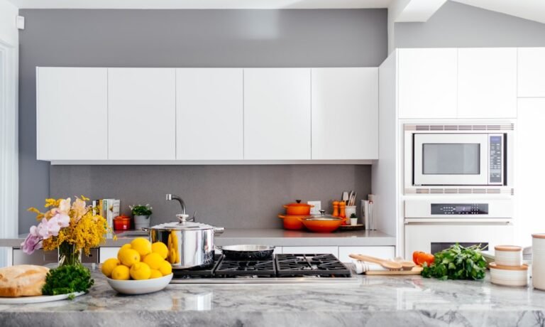 Kitchen counter with appliances and fresh produce.